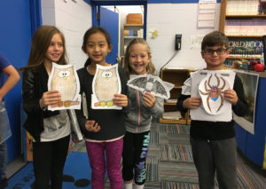 Second and third graders complete research project about owls, bats and spiders.