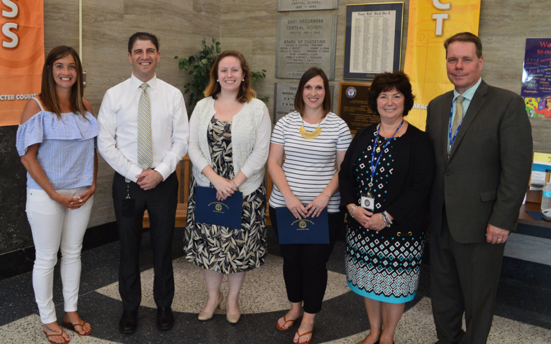 Four Teachers Receive Tenure