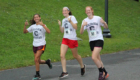 Students running in Teal Ribbon Run in Albany's Washington Park