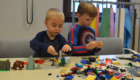 Students playing with Legos