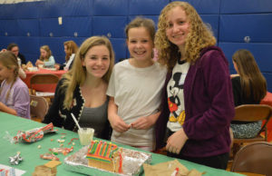 Students make a gingerbread house