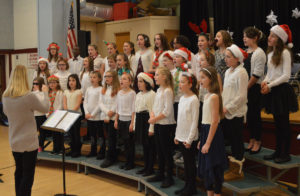Red Mill chorus performing at Holiday Concert
