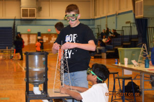 Students build tower during Science Olympiad competition