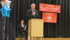 John Caporta speaking at the Red Mill Moving Up Ceremony in 2017.