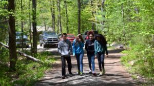 Students walk together on trail