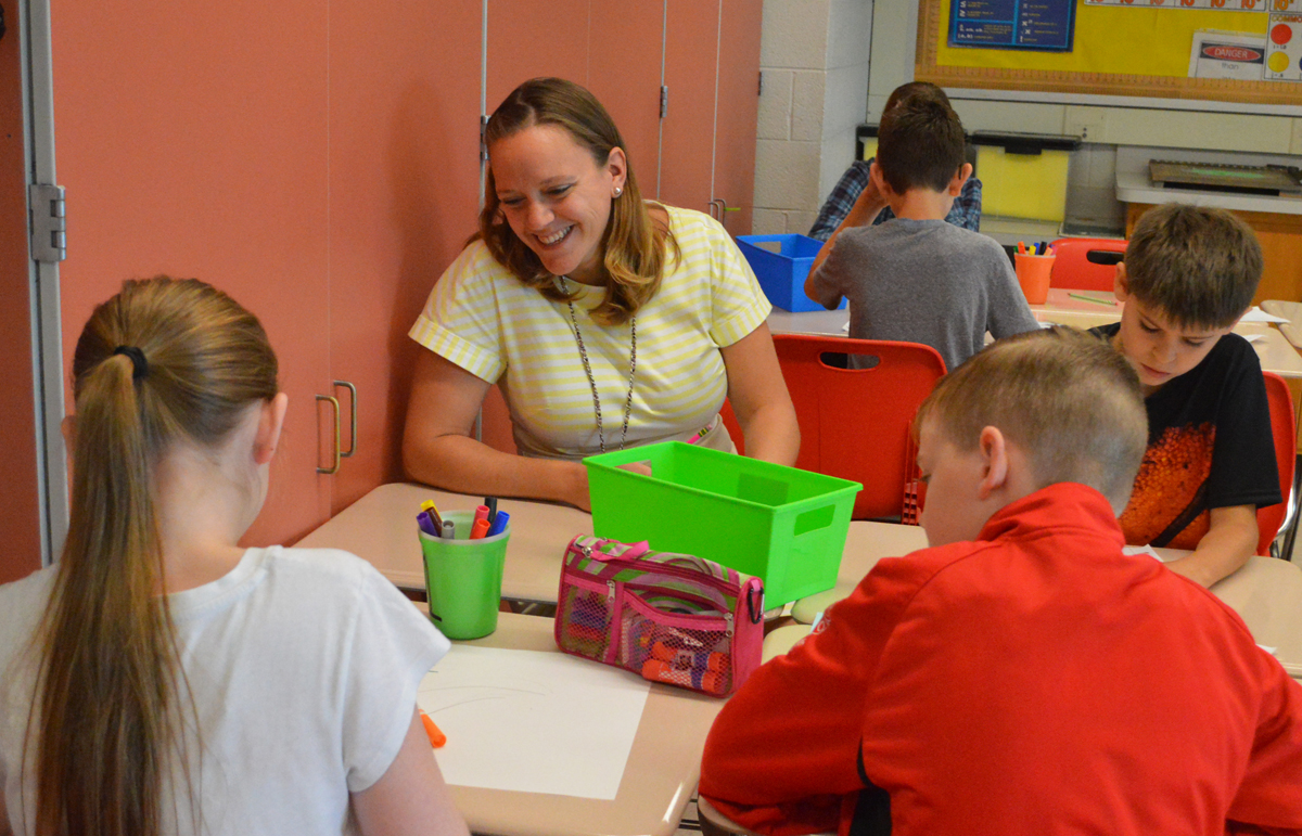 Megan Lopez working with students