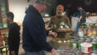 East Greenbush teachers package holiday dinner baskets at the Nassau Resource Center Food Pantry