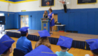 Mrs. Adams and Mrs. D'Amico at podium