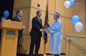 Student receives diploma