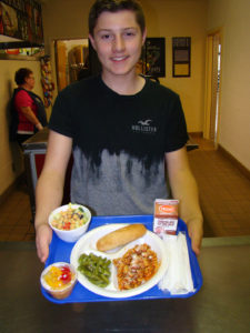 Student with lunch tray