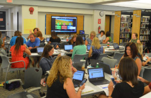 Teachers work together at professional development