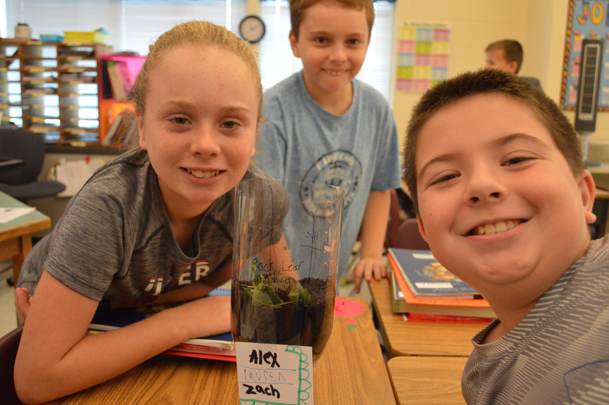 Students make an eco-column in science class