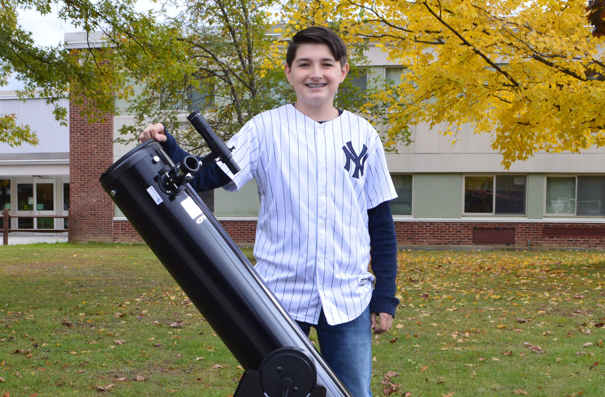 Ryan Krulikowski with telescope