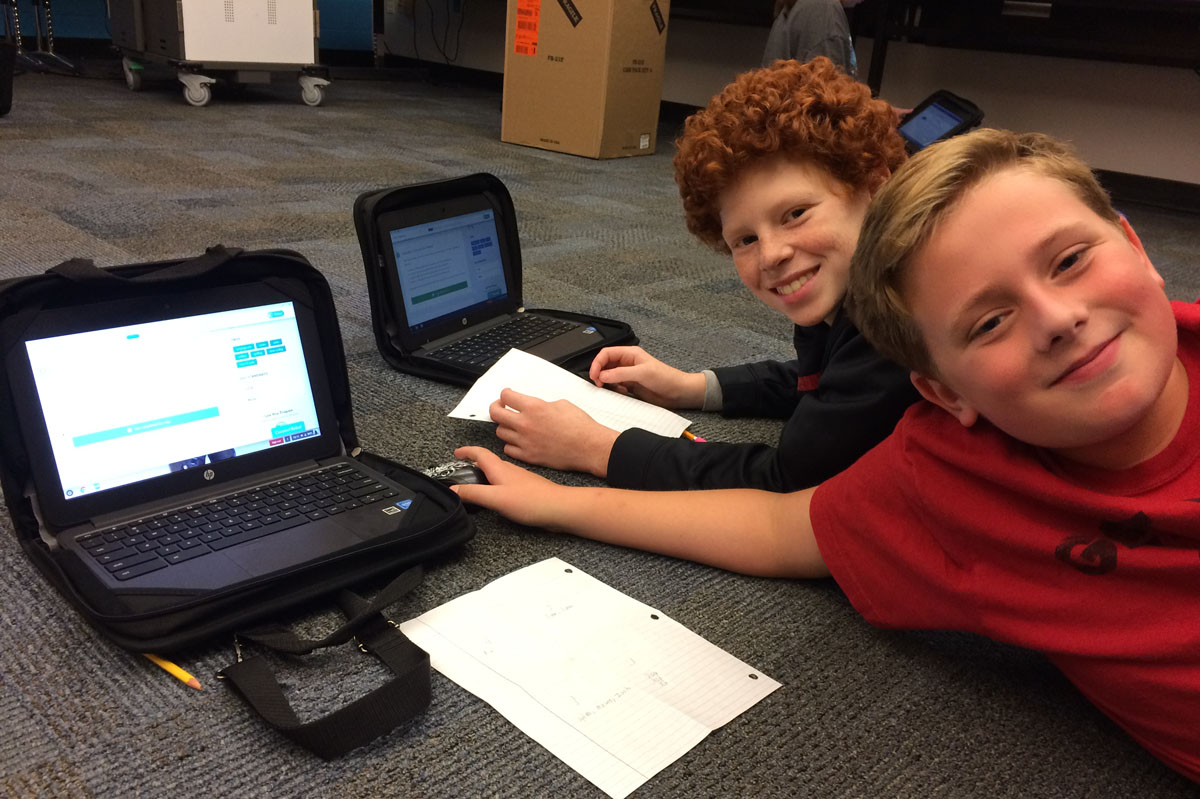 Students coding on chromebooks