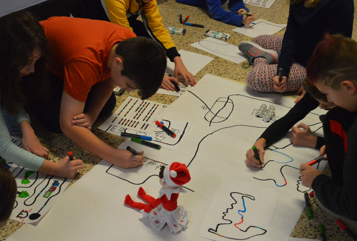 Students drawing winter town
