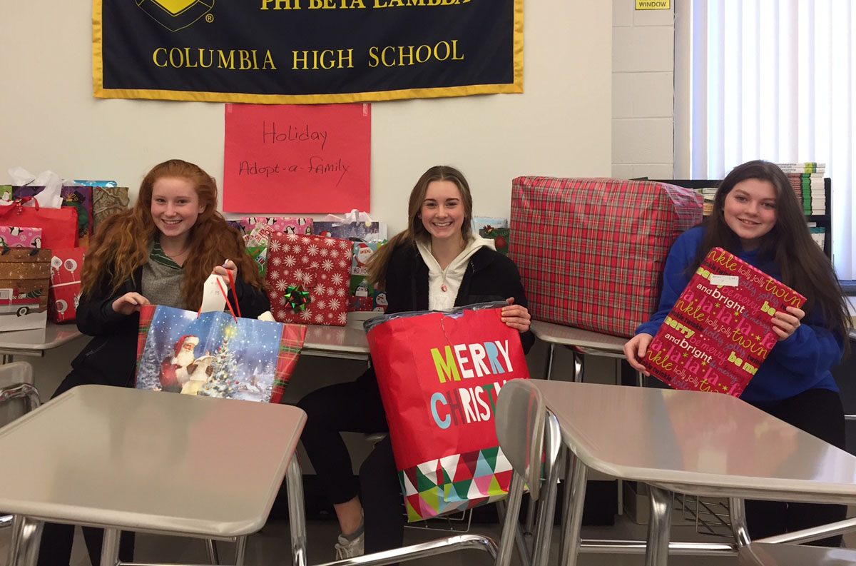 Students with Christmas gifts