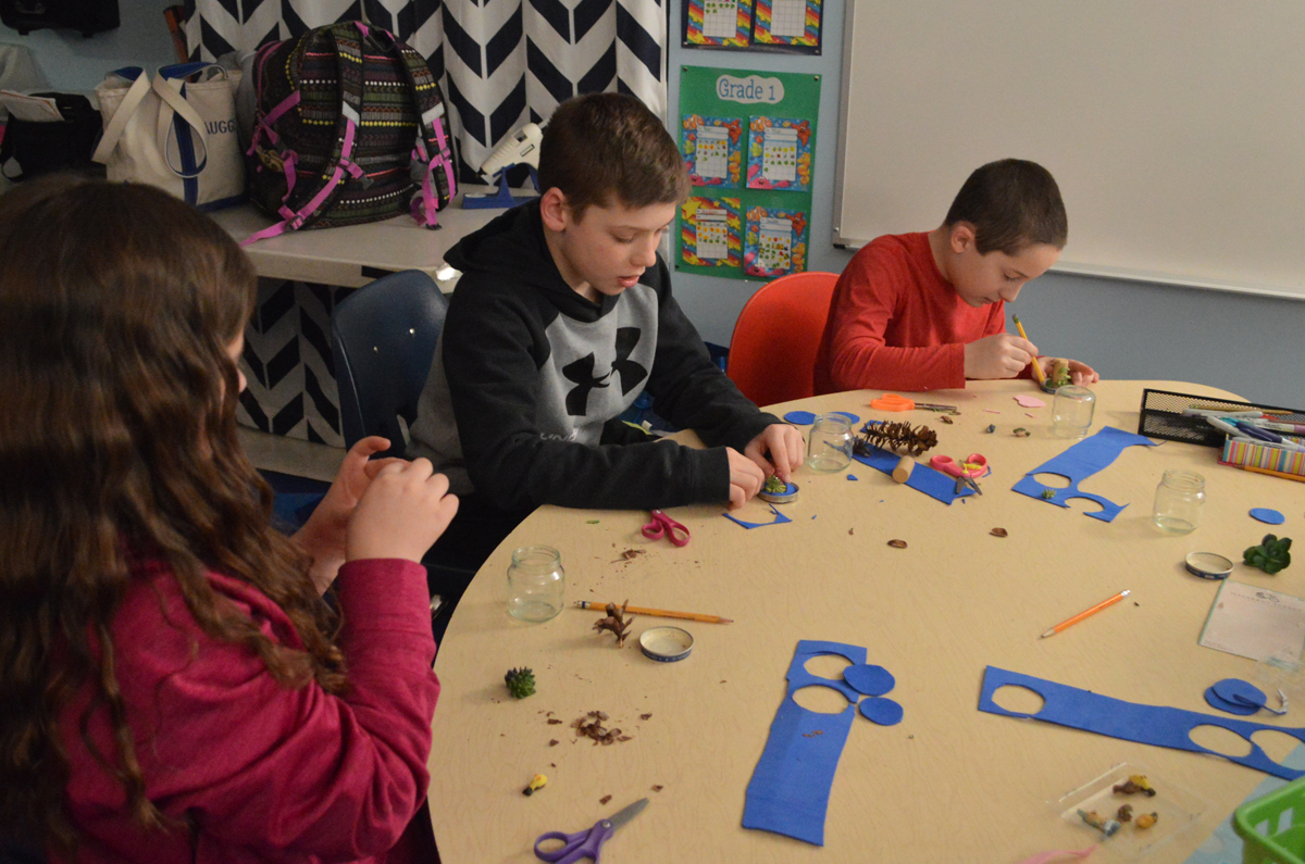 Students making arts and crafts