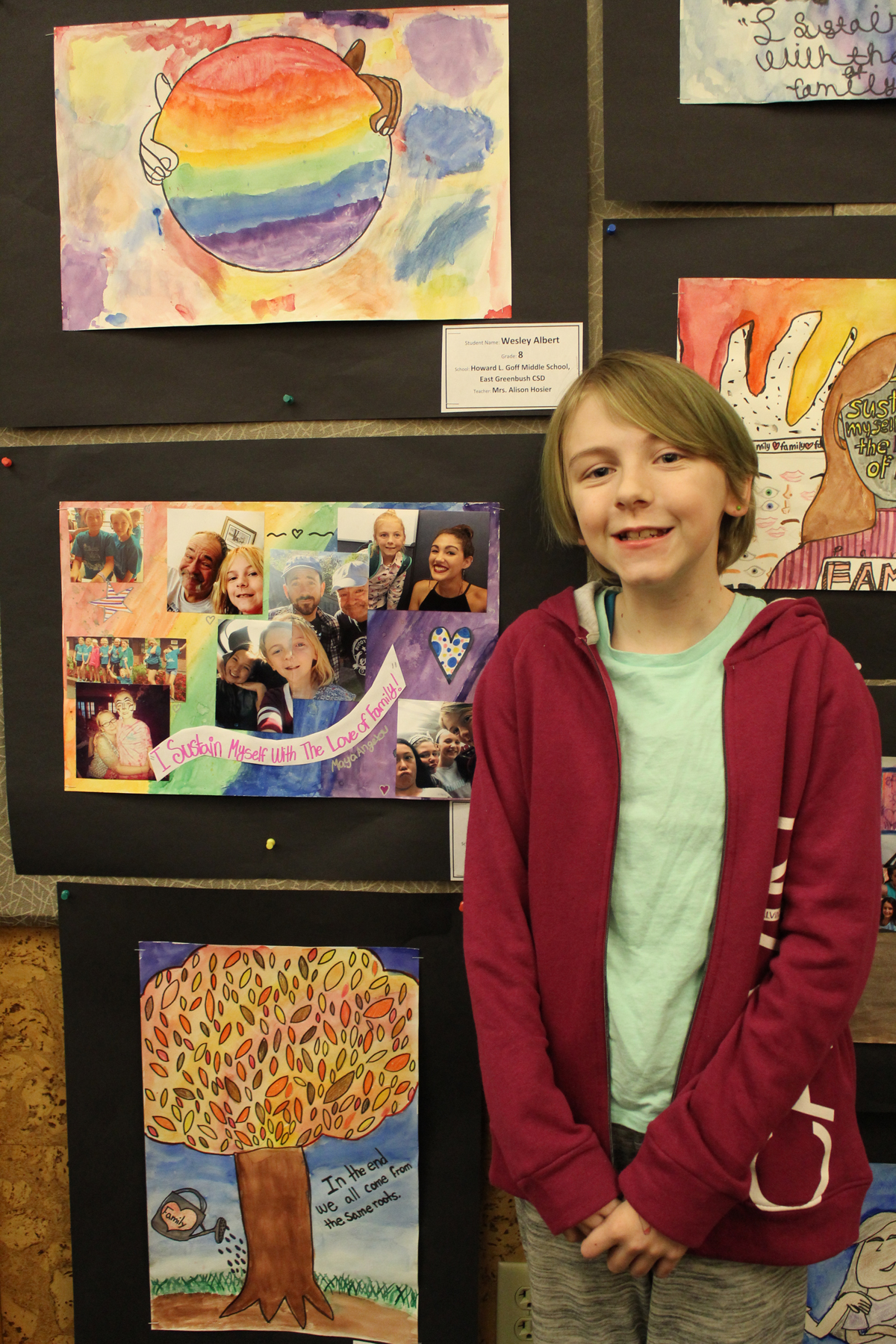 Student with artwork at MLK Art Exhibit