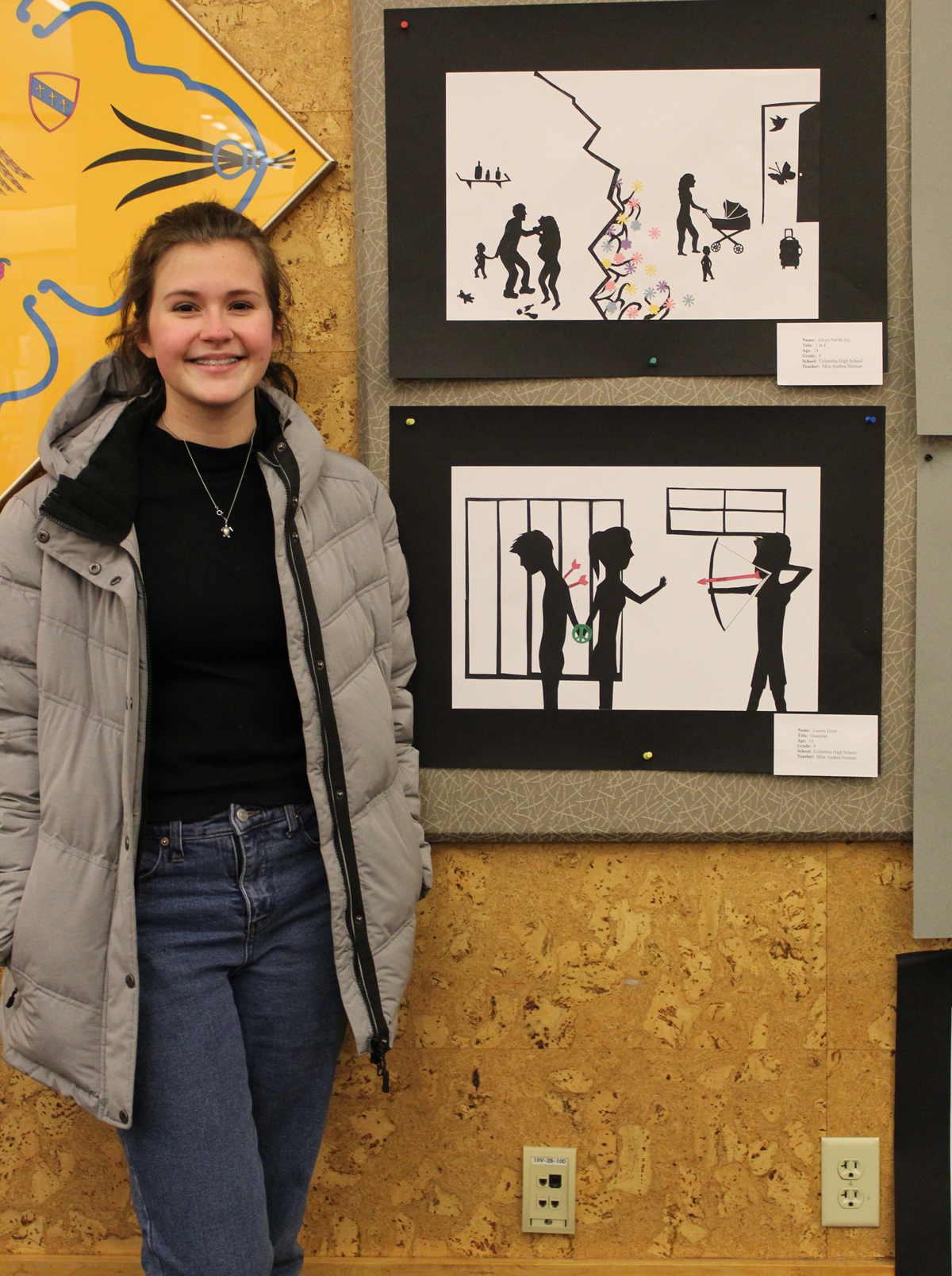 Student with artwork at MLK Art Exhibit