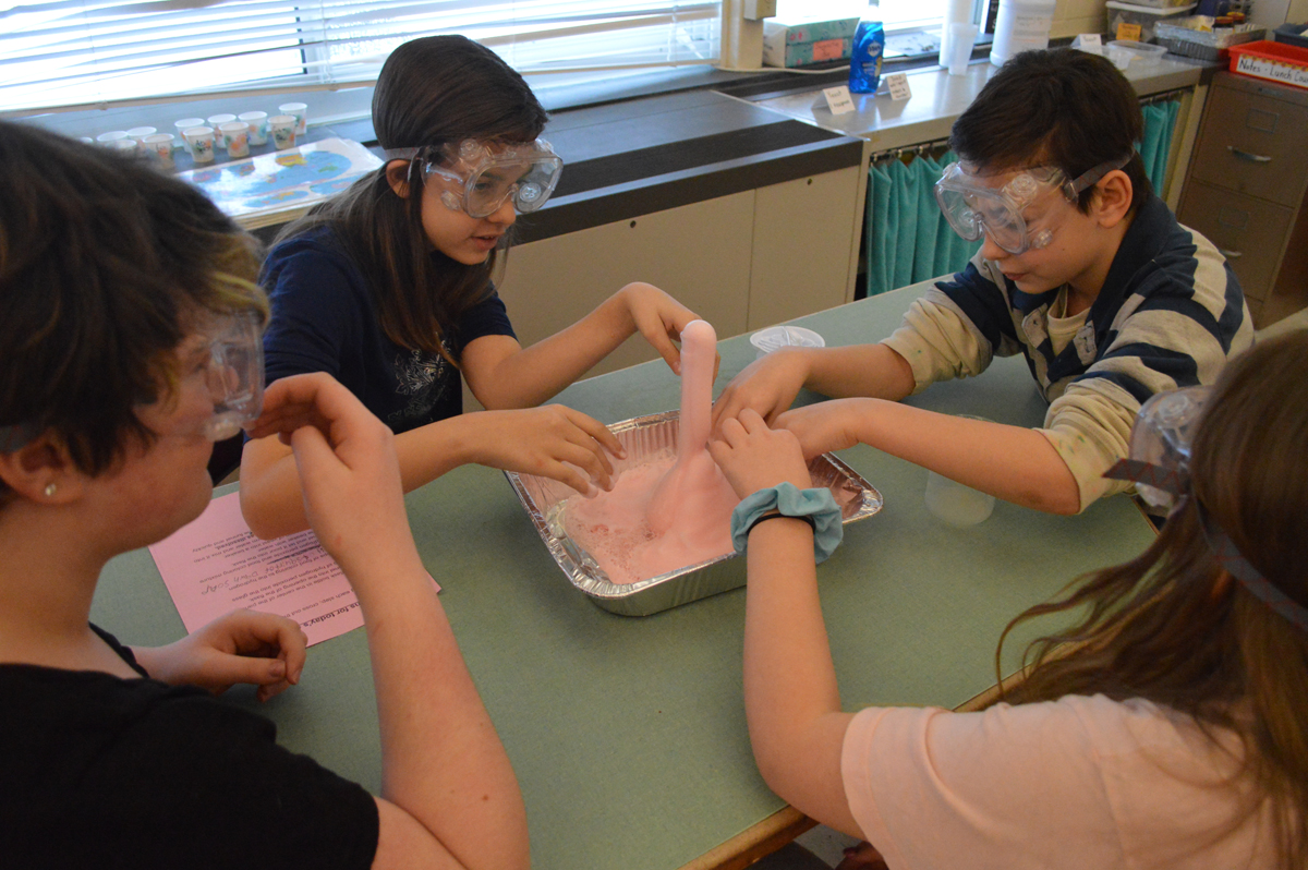 Students conduct chemistry experiment