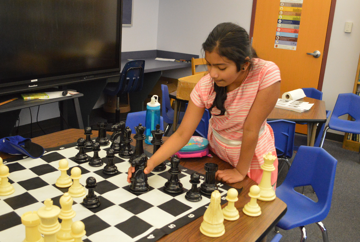 Student plays chess