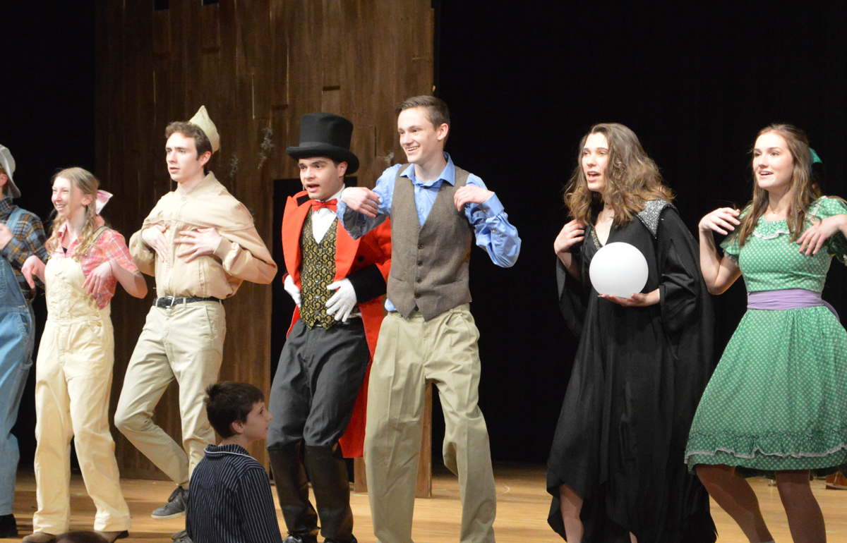 Students performing in "Big Fish" on CHS stage