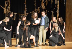 Students performing in "Big Fish" on CHS stage