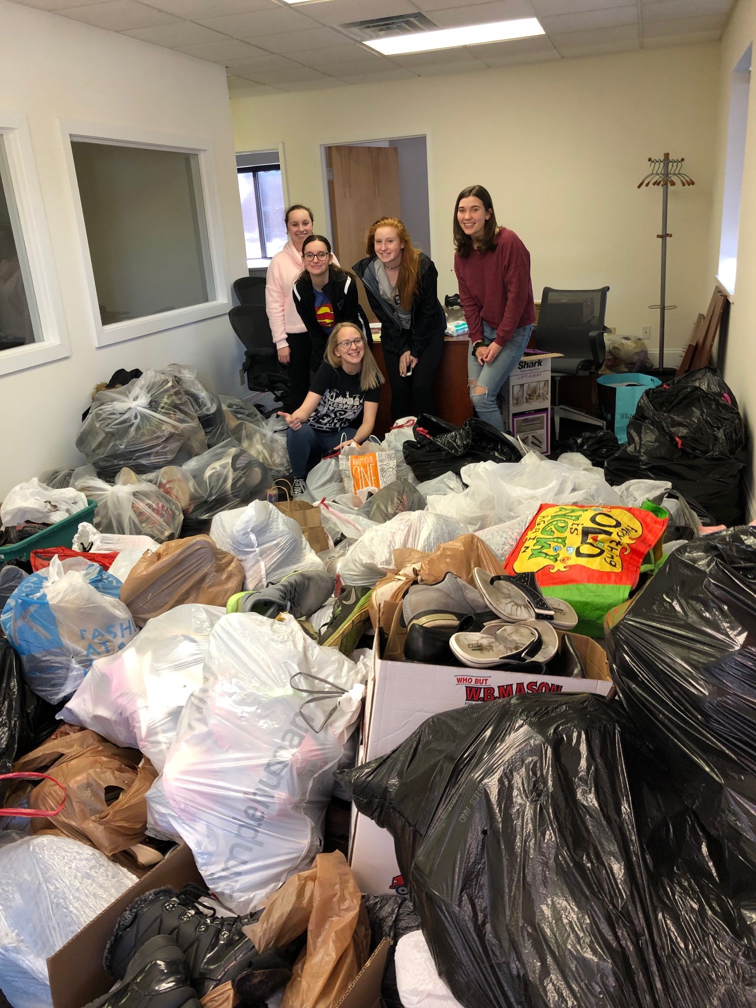 Students collecting shoes for donation