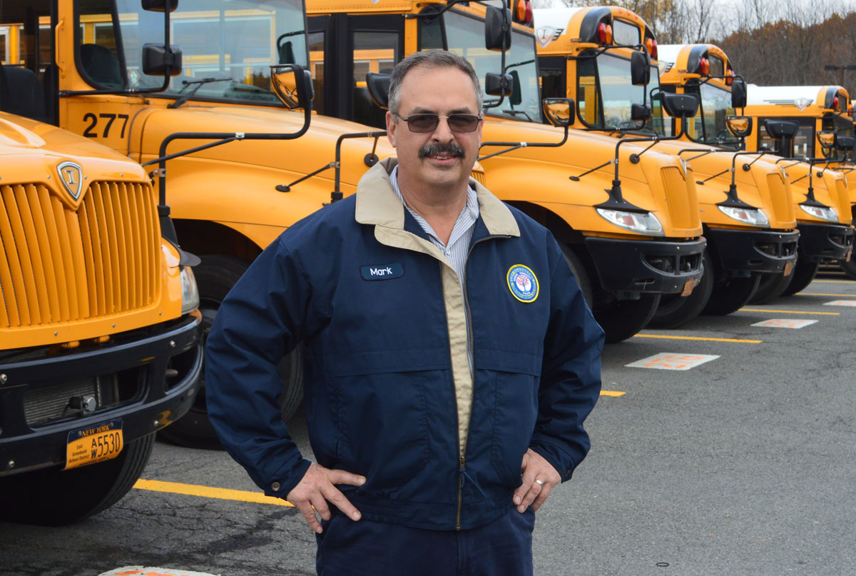 Mark Noeth in school bus parking lot