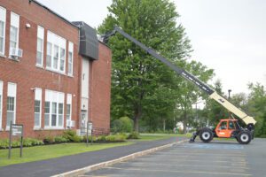 Blocks lifted onto roof at Genet Elementary School