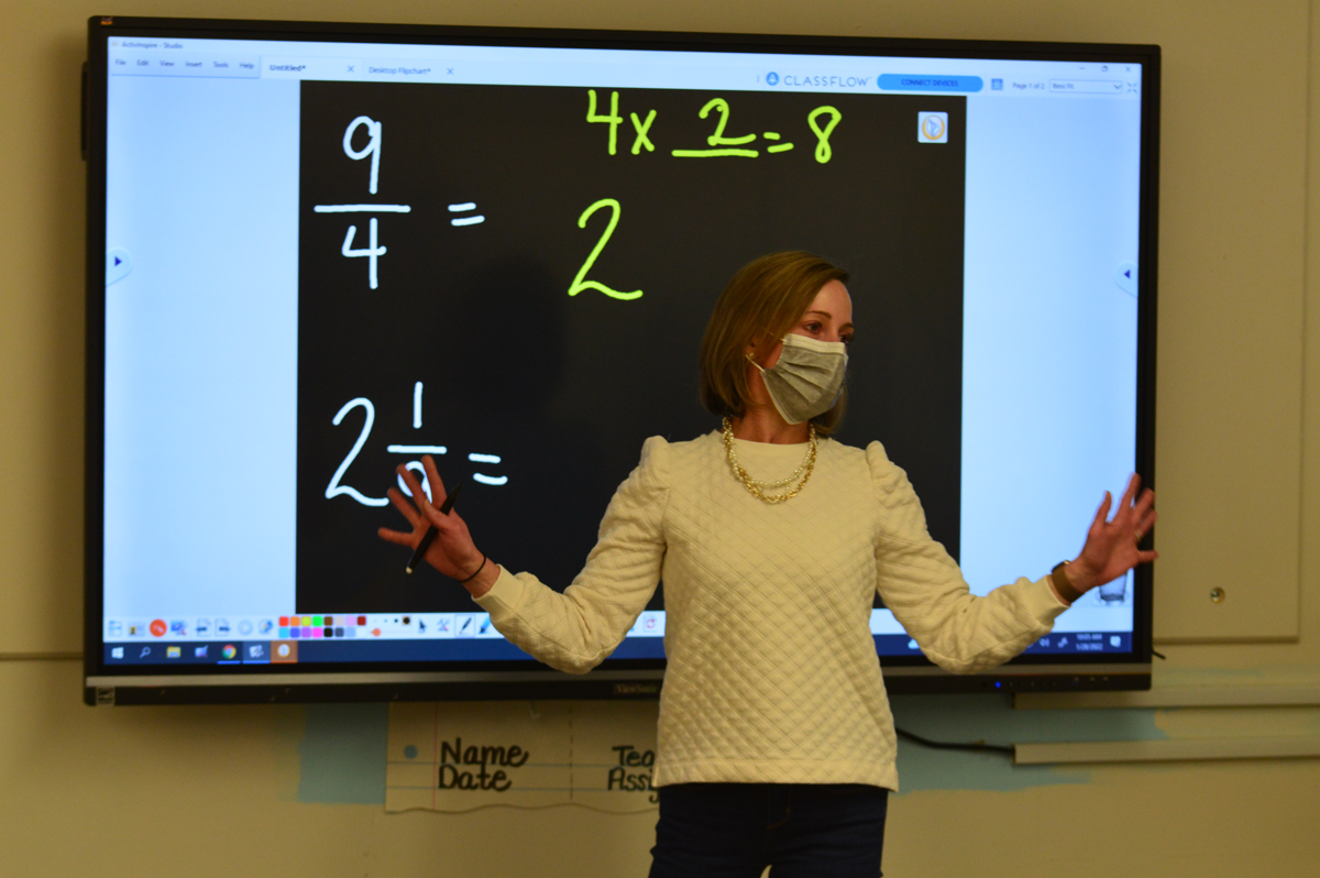 Red Mill Teacher Misty Hayes instructs a math lesson in front of a new ViewSonic board