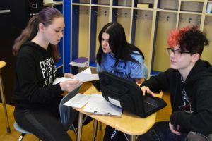 Students work on a group activity in class