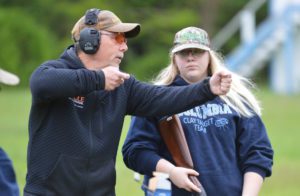 Students receiving instruction on the trap shooting range.