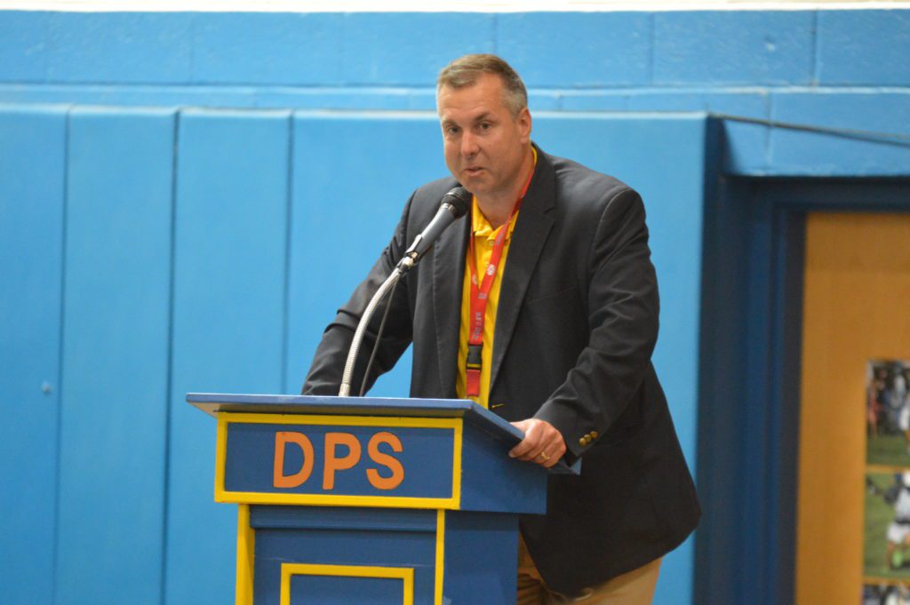Principal Jack Alvey addresses students at the DPS Moving Up Ceremony