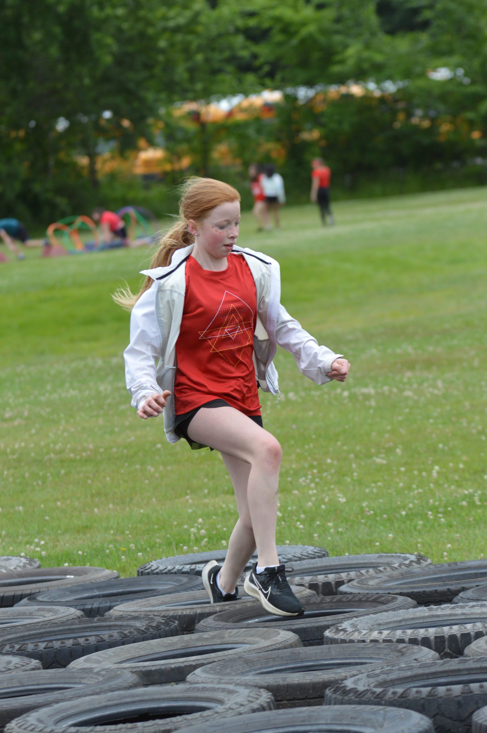 Student going through obstacle course at Goff Field Day