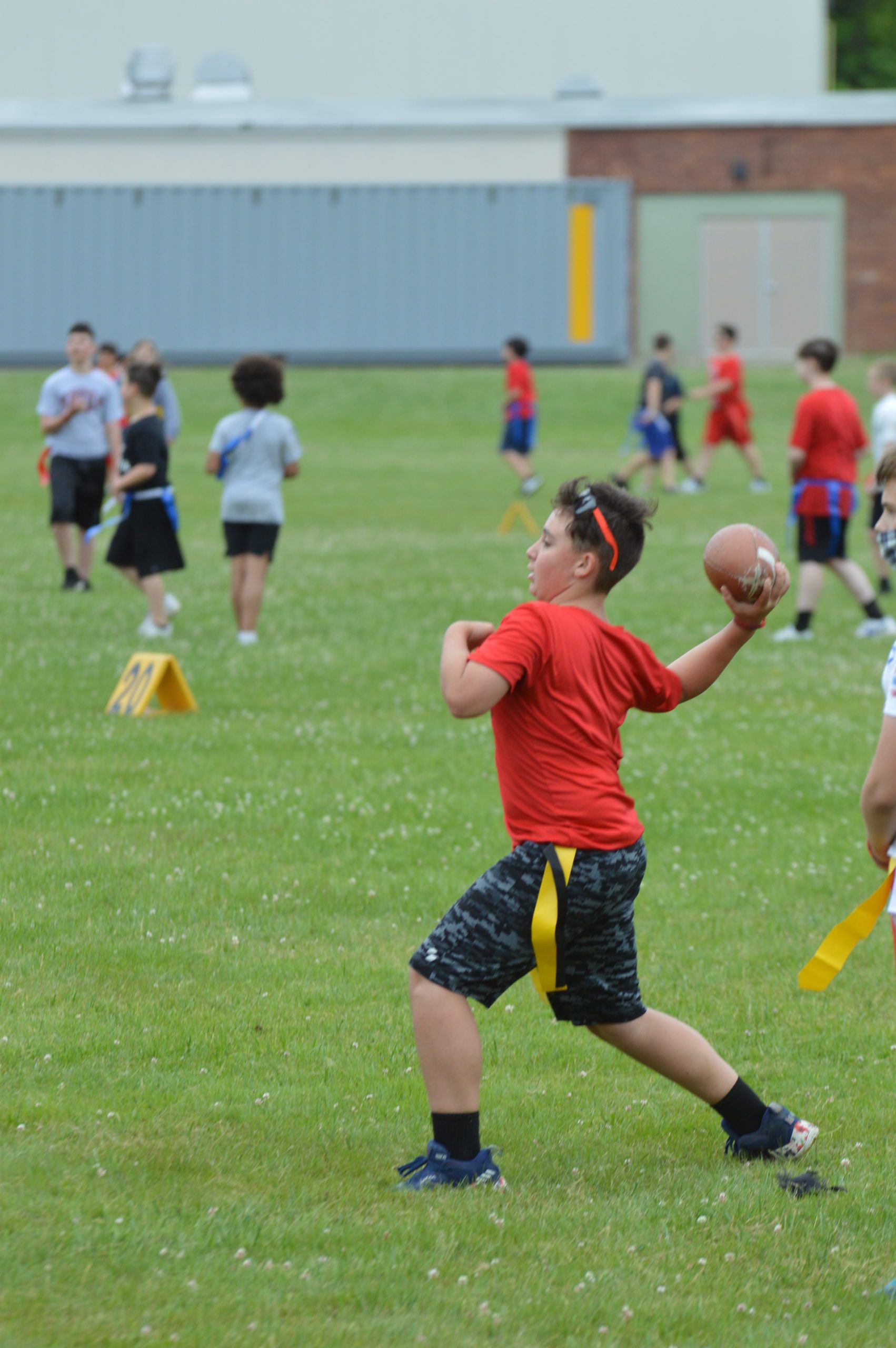 Students playing football at Goff Field Day