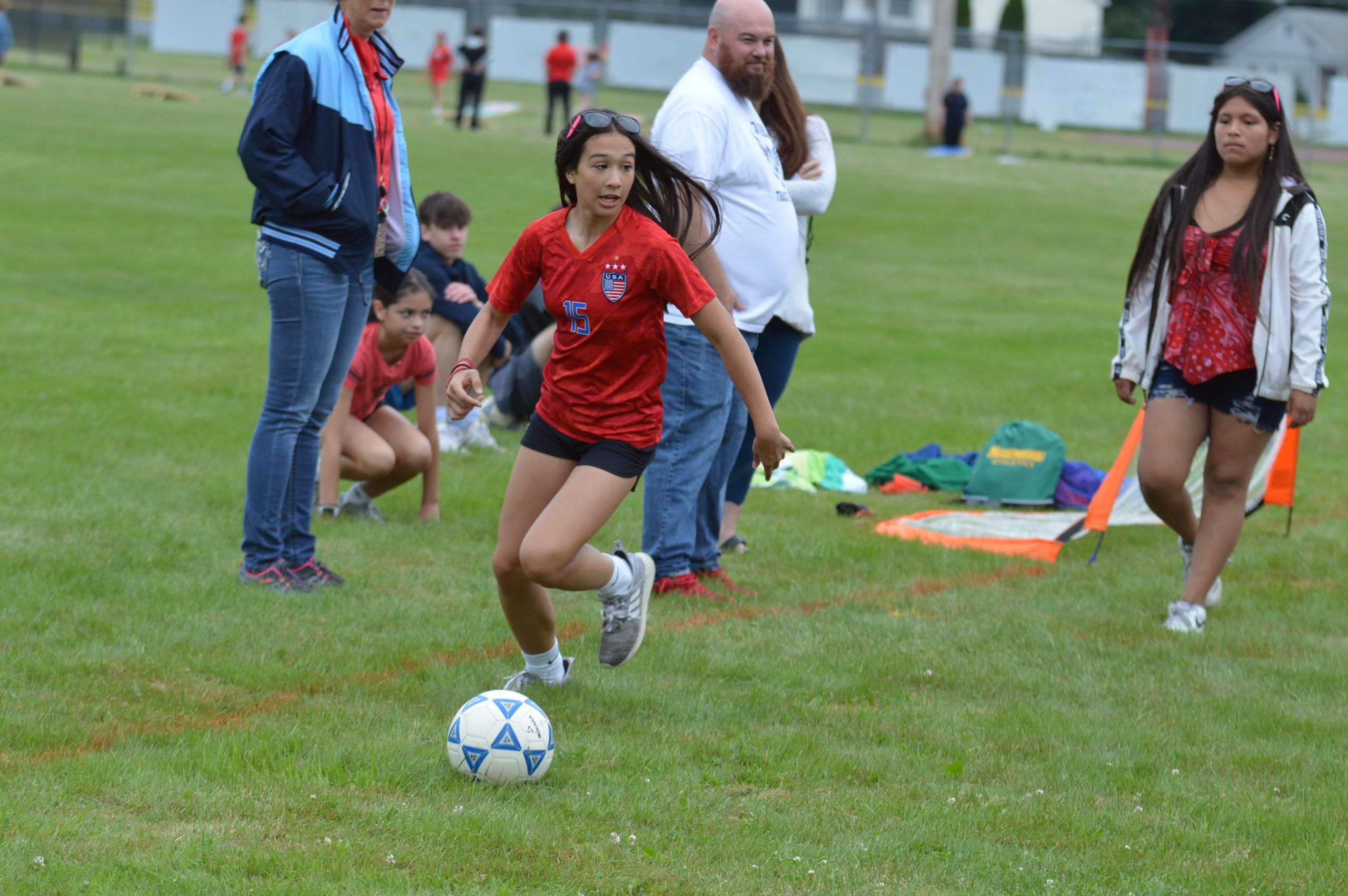 Students playing soccer at Goff Field Day