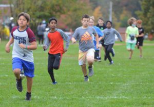 Students running in the 2021 Fall Fun Run