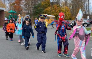 DPS students walking in their Halloween Parade