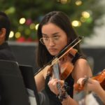 Student performing a holiday concert