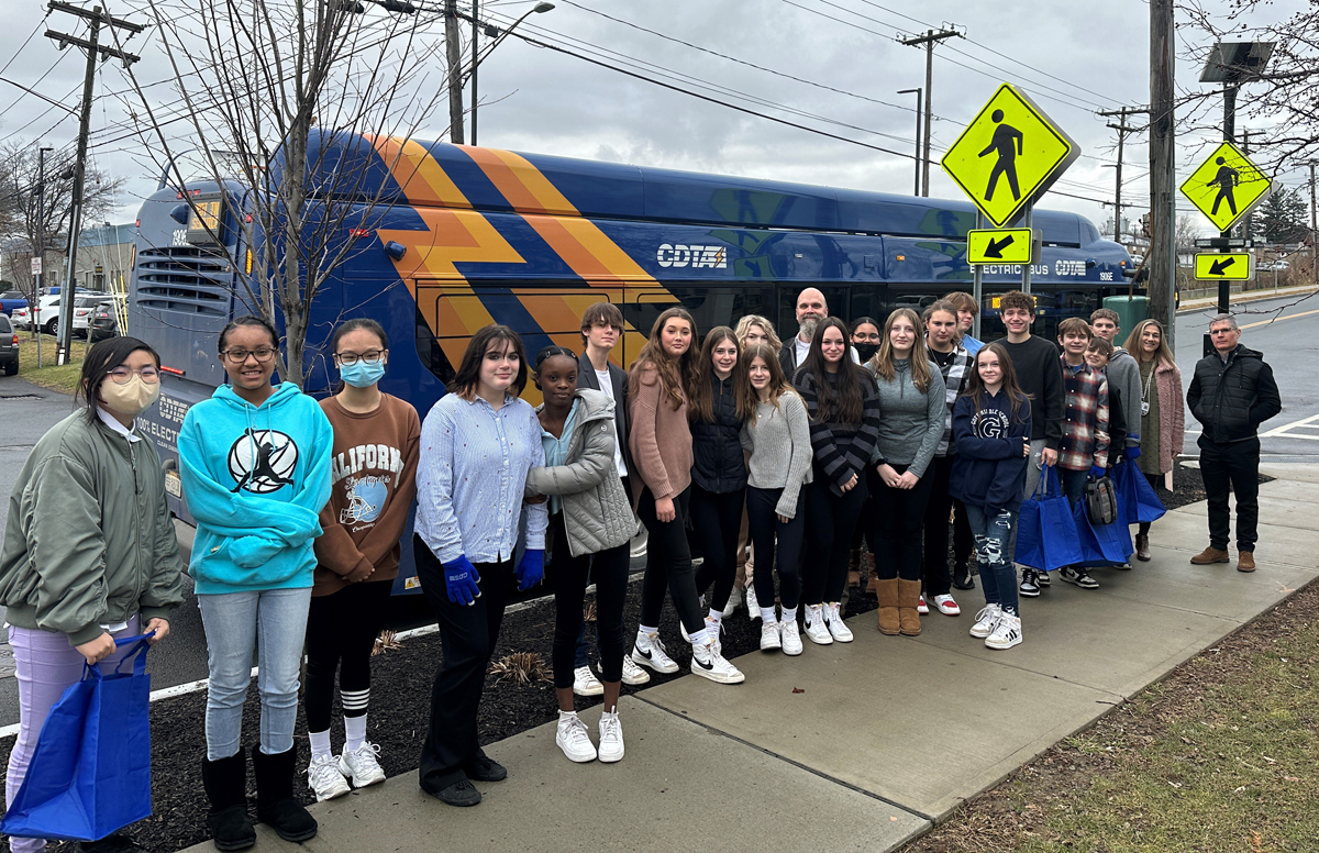Goff students in front of a CDTA bus as part of a field trip