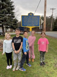Bell Top students in front of historical marker
