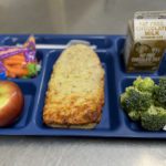 French bread pizza on a lunch tray
