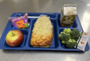 French bread pizza on a lunch tray