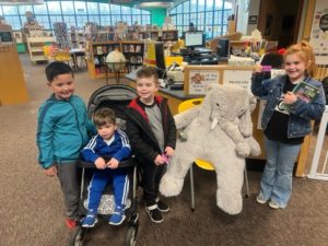 Students with Veda the stuffed elephant at the East Greenbush Community Library