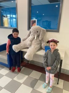 Students with Veda the stuffed elephant at the East Greenbush YMCA