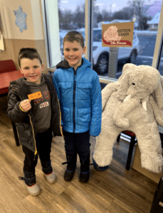 A student with Veda the stuffed elephant at Stewart's in East Greenbush.