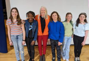Holly Goldberg Sloan with student interviewers at an assembly on Monday, April 3