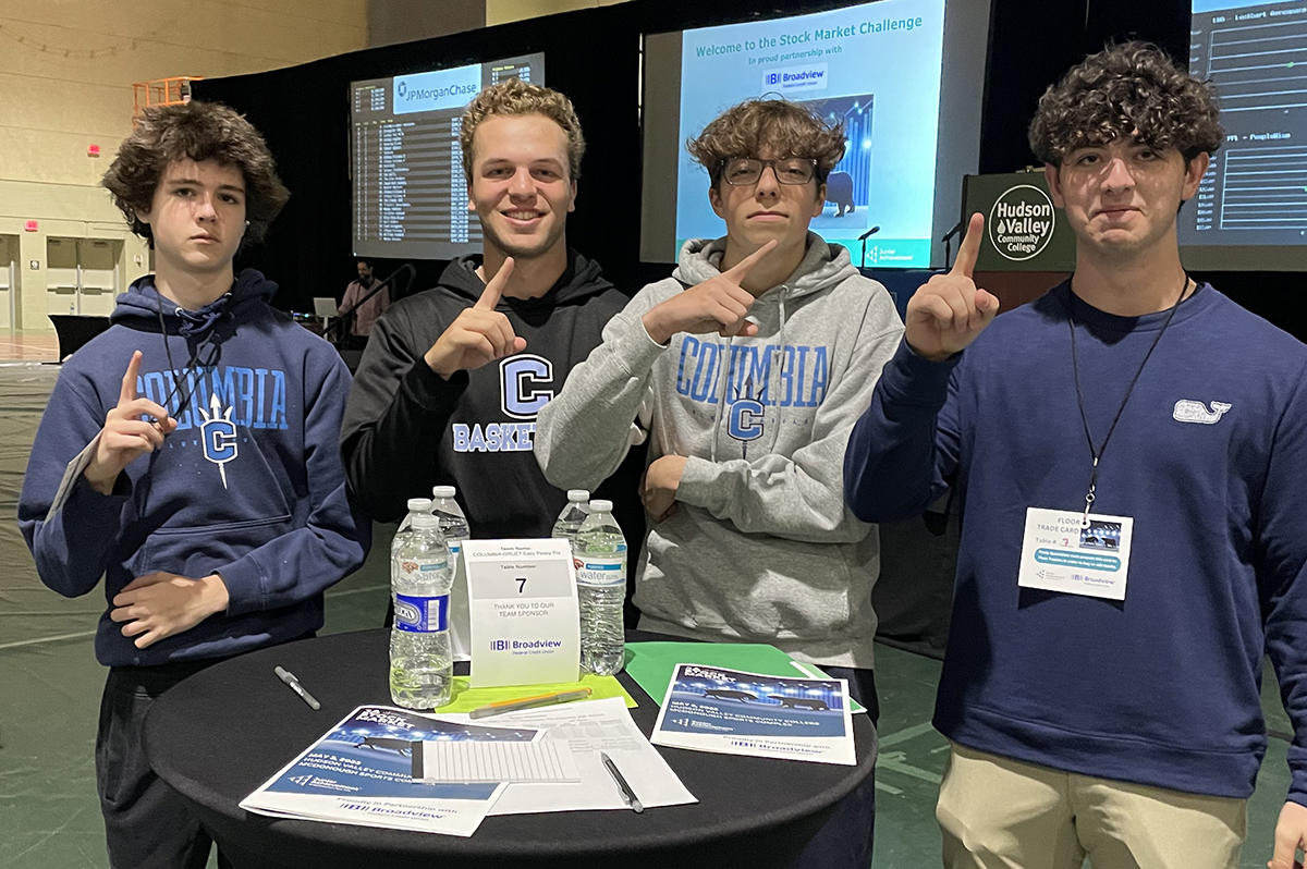 Columbia High School students Grayson Przybylek, Kyle Blake, Zack Vumbaco, Thomas Lento at the Stock Market Challenge at HVCC.