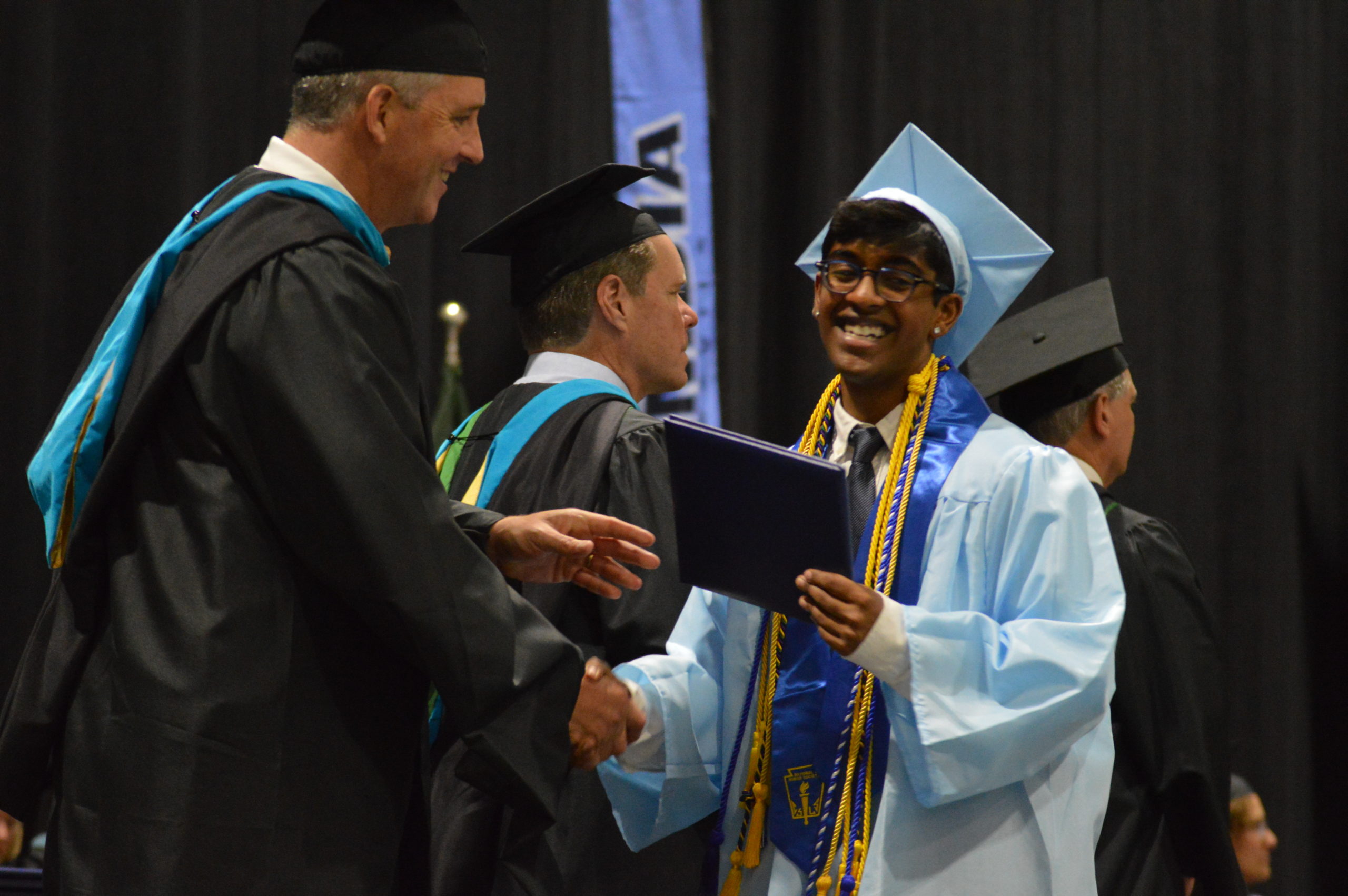 Hariharan Conji '23 receives his high school diploma at the Columbia High School Class of 2023 Graduation Ceremony.